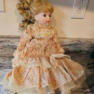Vintage Porcelain Doll, Blonde Curly Hair, Blue Eyes, Floral Lace Dress
